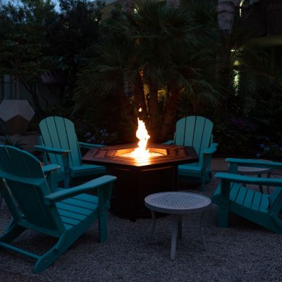 four chairs around a fire pit